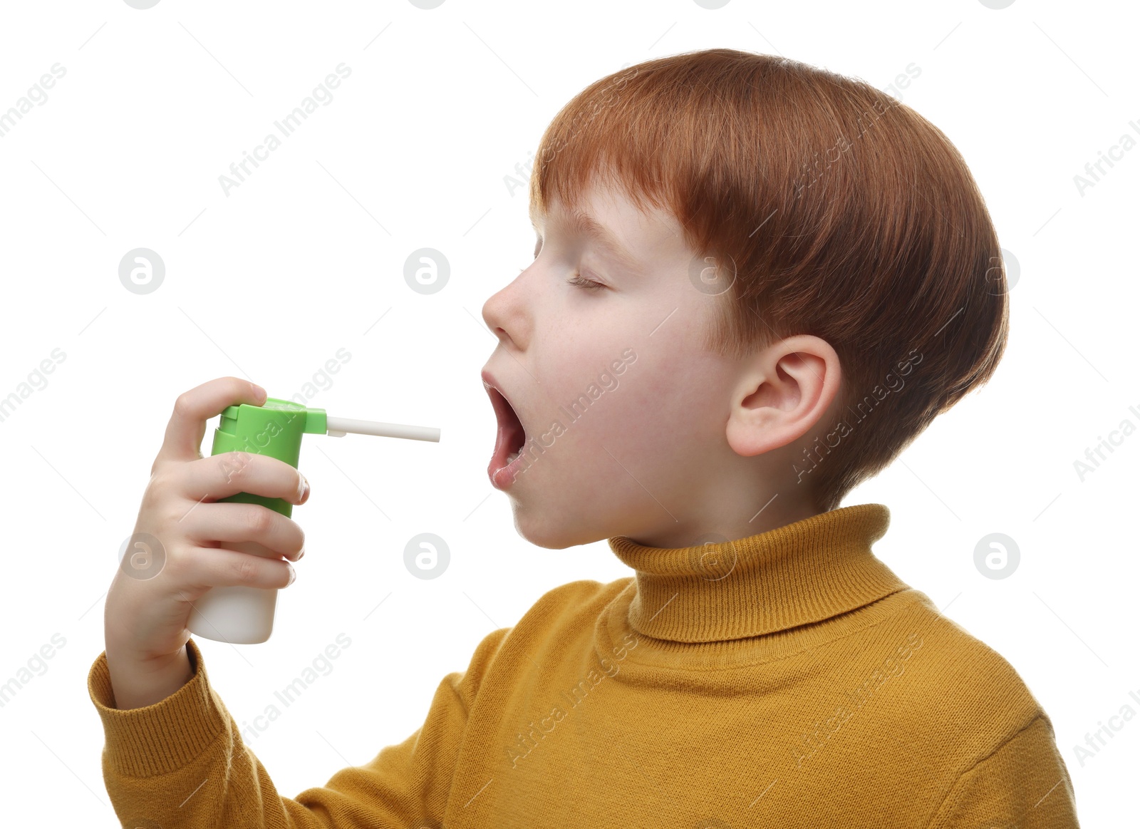 Photo of Little boy using throat spray on white background