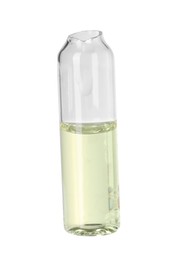 Photo of Open glass ampoule with liquid isolated on white