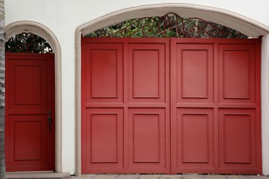 Photo of Exterior of building with beautiful wooden gates