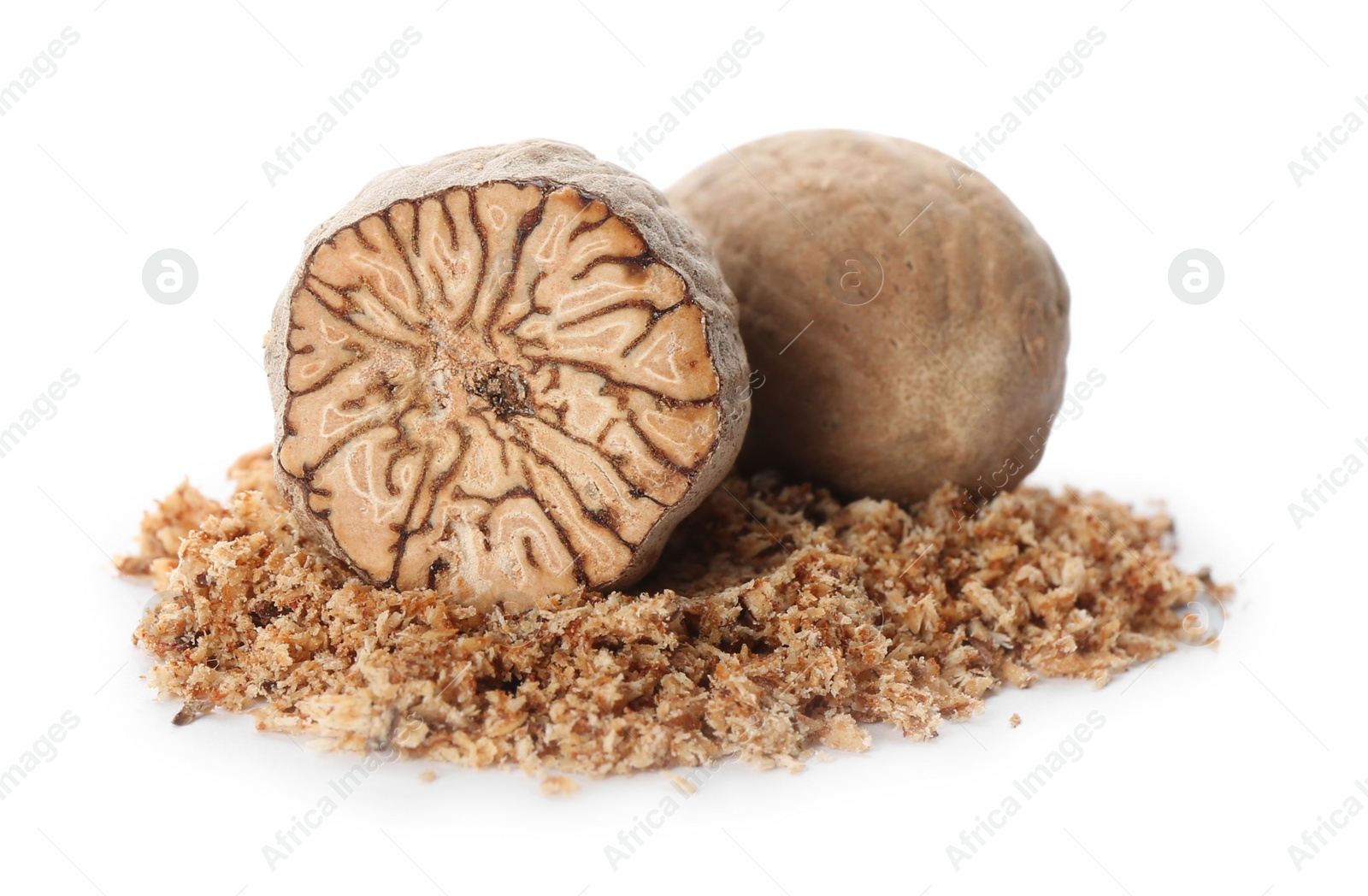 Photo of Grated nutmeg and seeds isolated on white