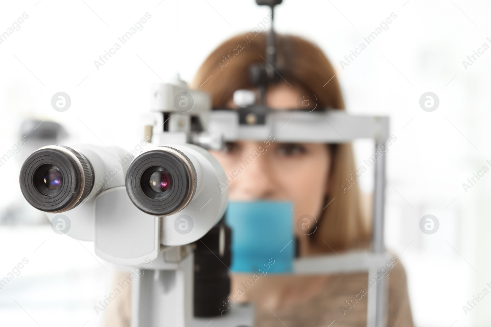 Photo of Woman visiting ophthalmologist in clinic