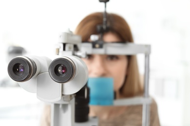 Woman visiting ophthalmologist in clinic