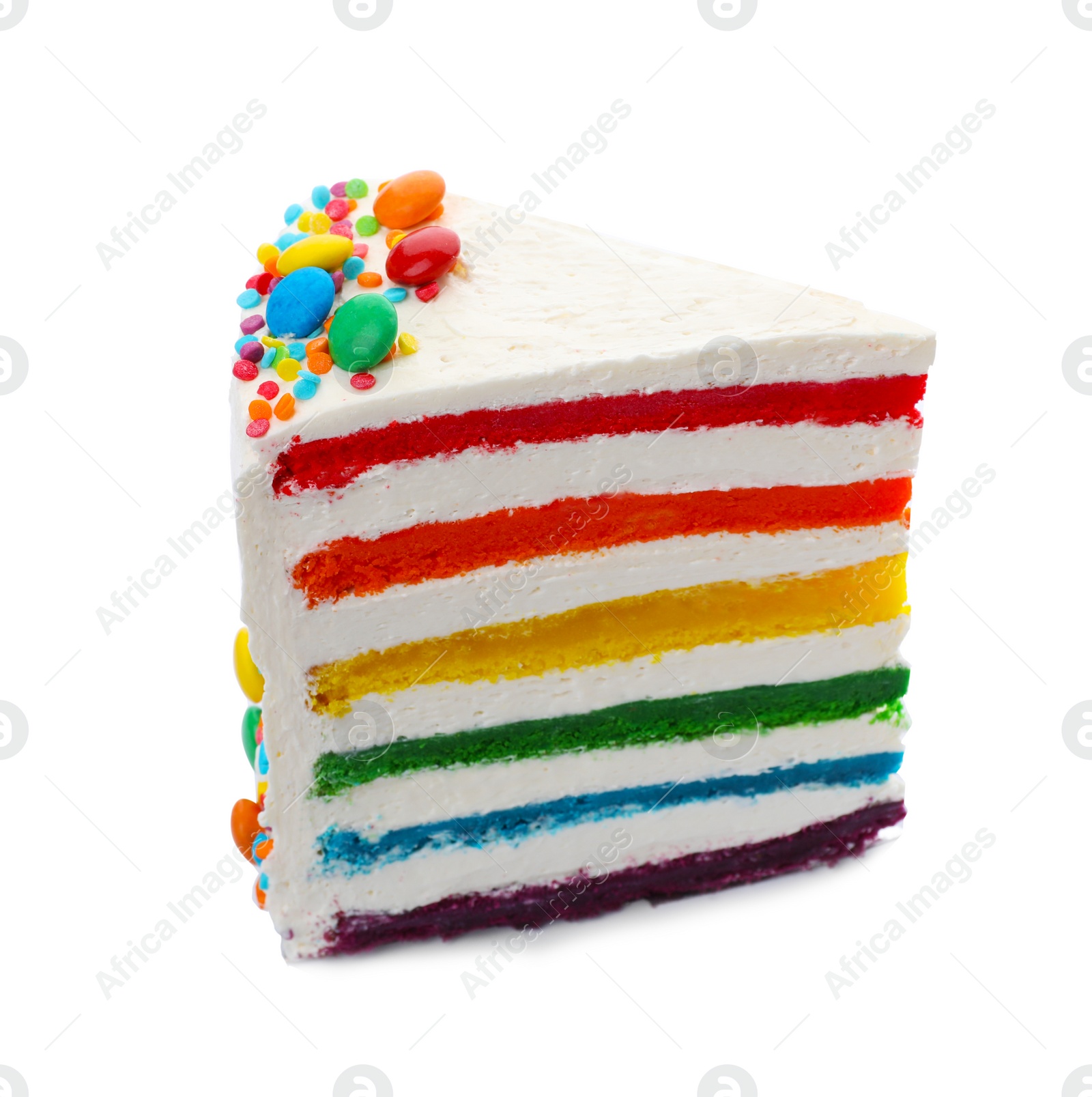 Photo of Slice of delicious rainbow cake on white background