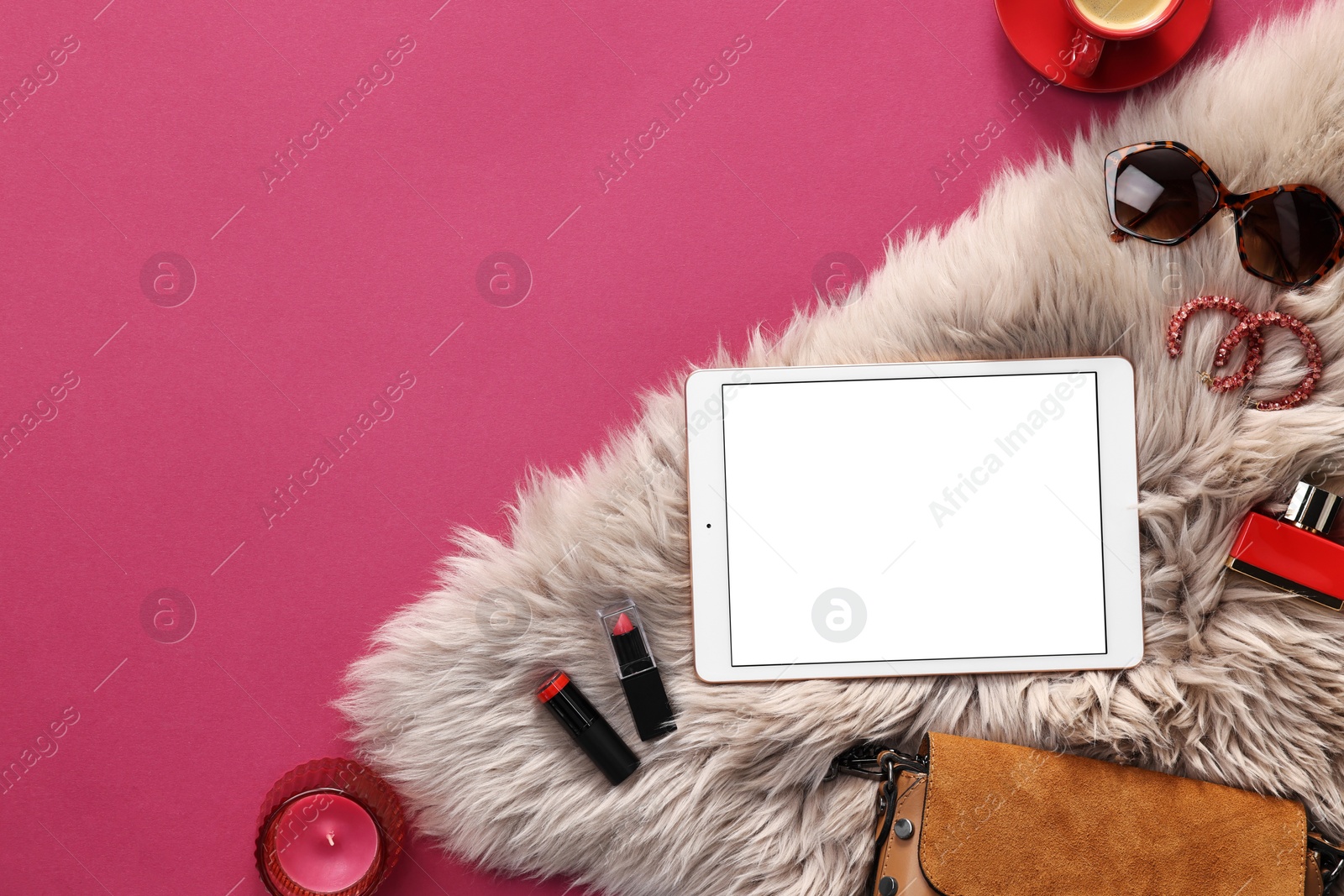 Photo of Flat lay composition with modern tablet on hot pink background. Space for text