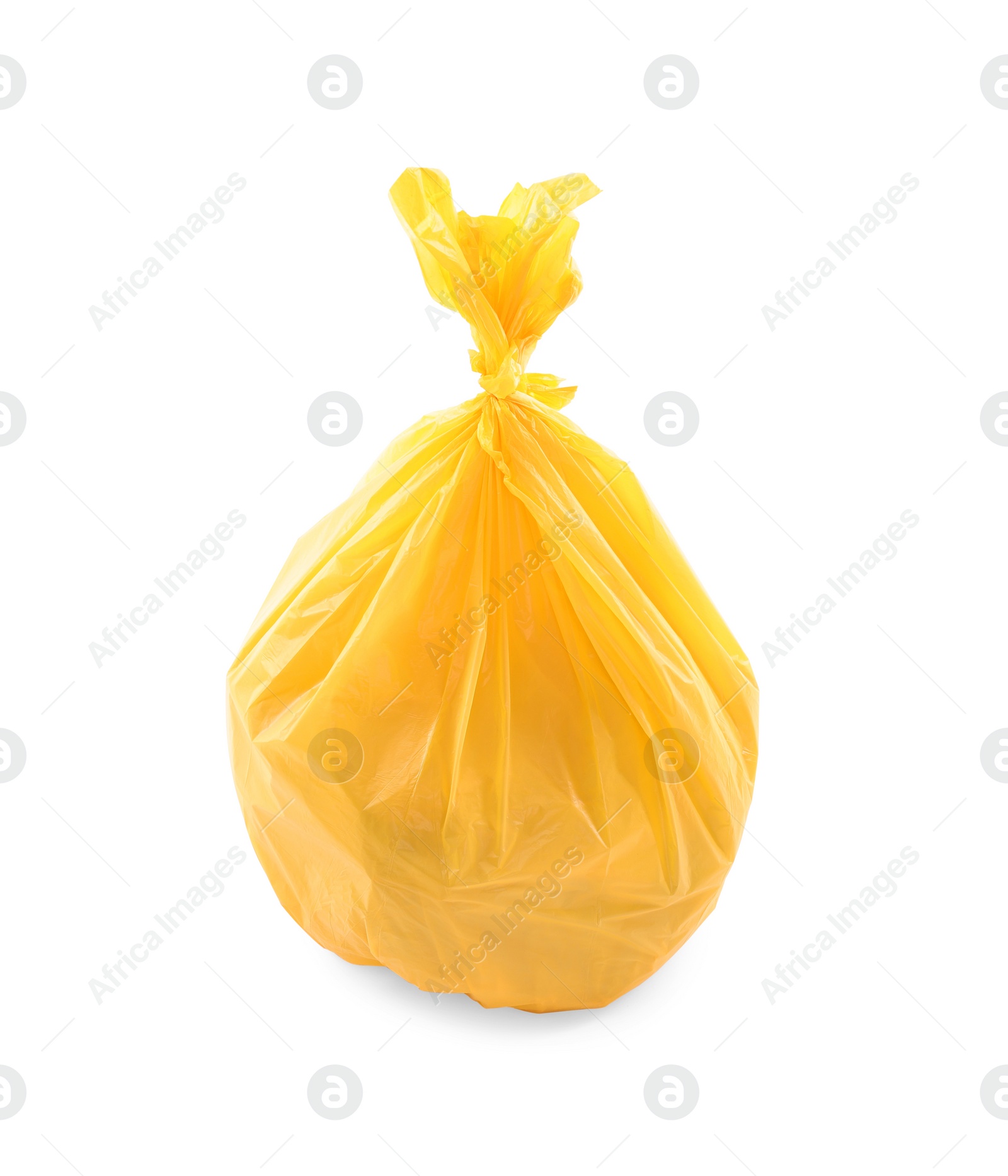 Photo of Yellow plastic garbage bag isolated on white