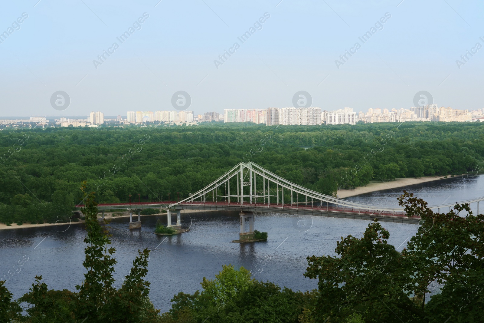 Photo of Beautiful cityscape with modern bridge over river