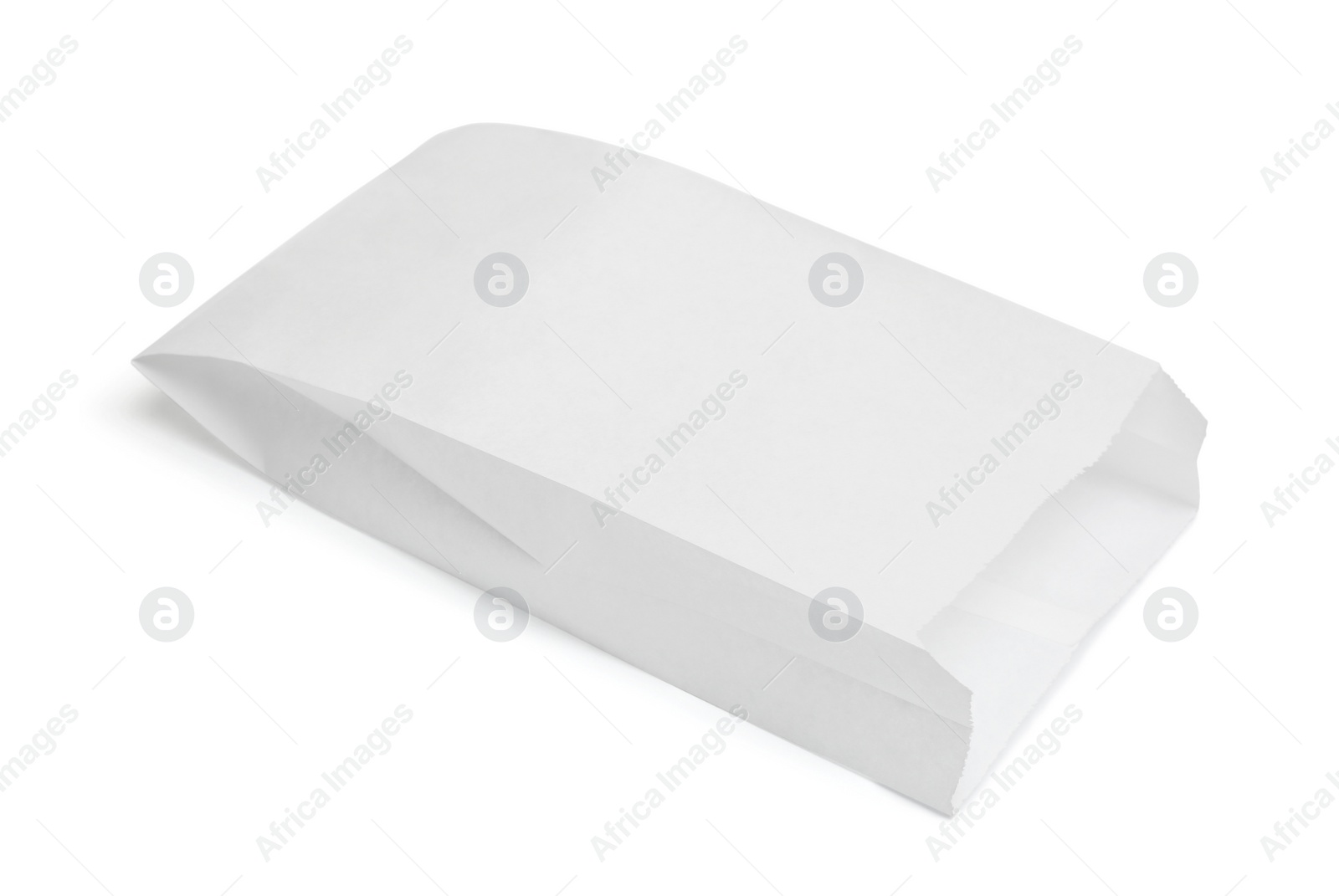 Photo of Blank paper bag isolated on white. Mockup for design