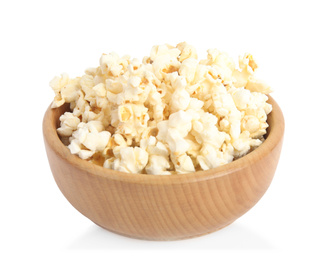 Wooden bowl of tasty pop corn isolated on white
