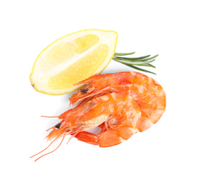 Photo of Delicious cooked shrimps, lemon and rosemary isolated on white, top view