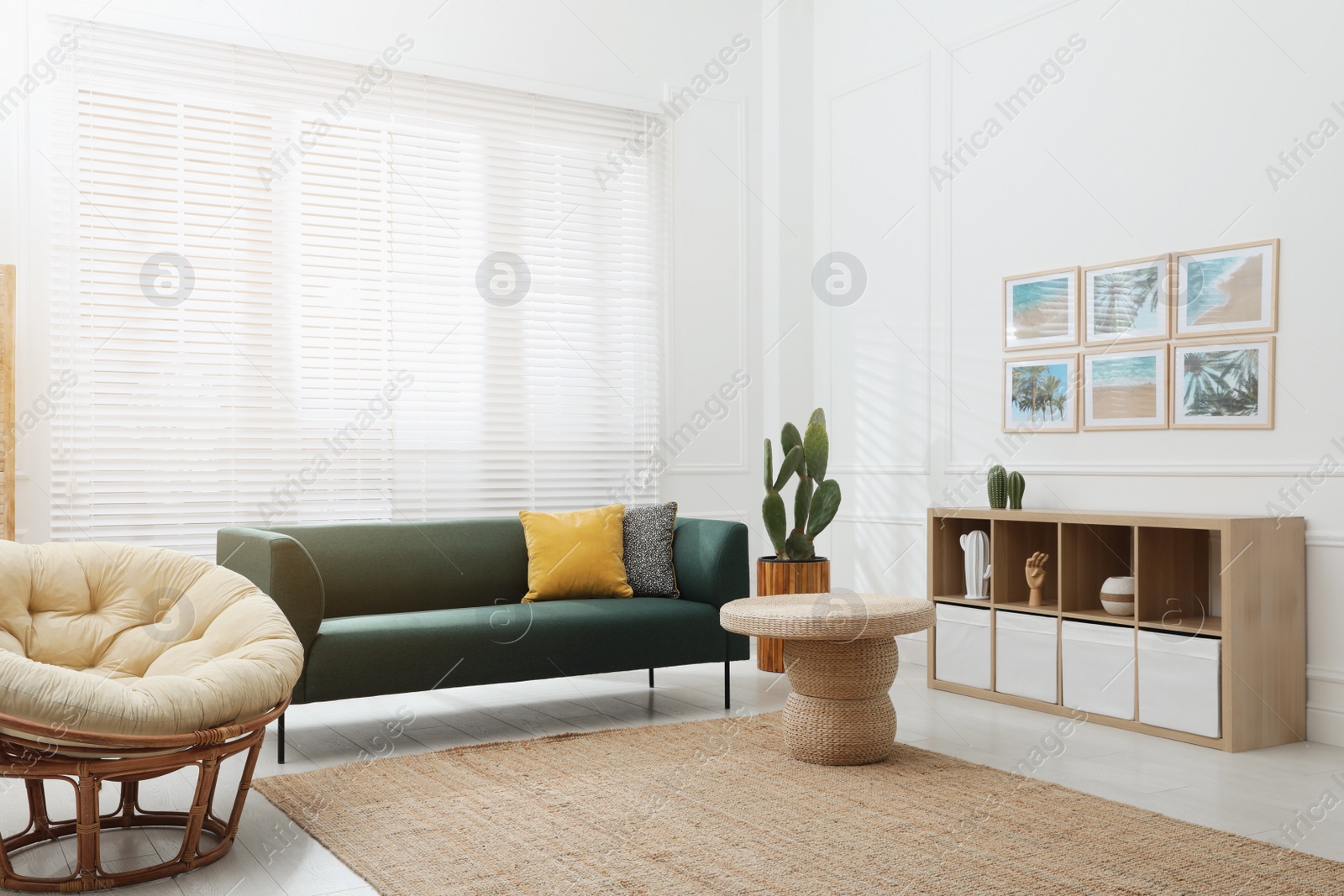 Photo of Comfortable sofa in modern living room. Interior design