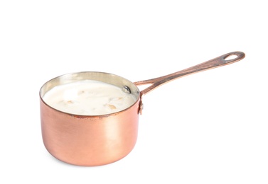 Photo of Delicious creamy sauce in pan on white background