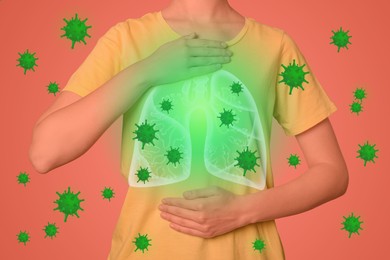 Image of Woman holding hands near chest with illustration of lungs and viruses that surrounding her on coral background, closeup