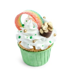 Photo of St. Patrick's day party. Tasty cupcake with sour rainbow belt and pot of gold toppers isolated on white