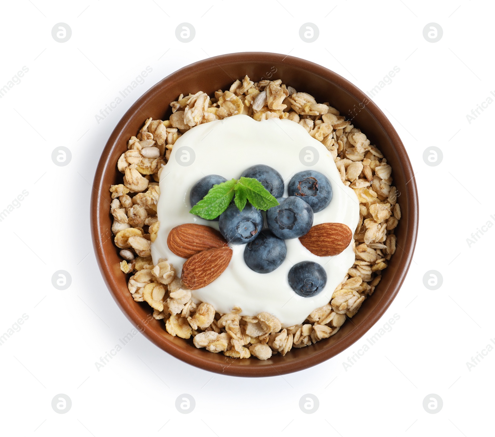 Photo of Bowl of tasty oatmeal with blueberries, yogurt and almond on white background, top view