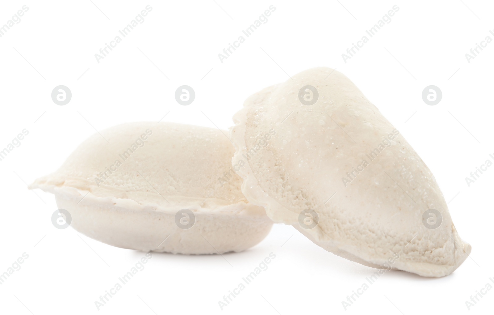 Photo of Raw dumplings with tasty filling on white background