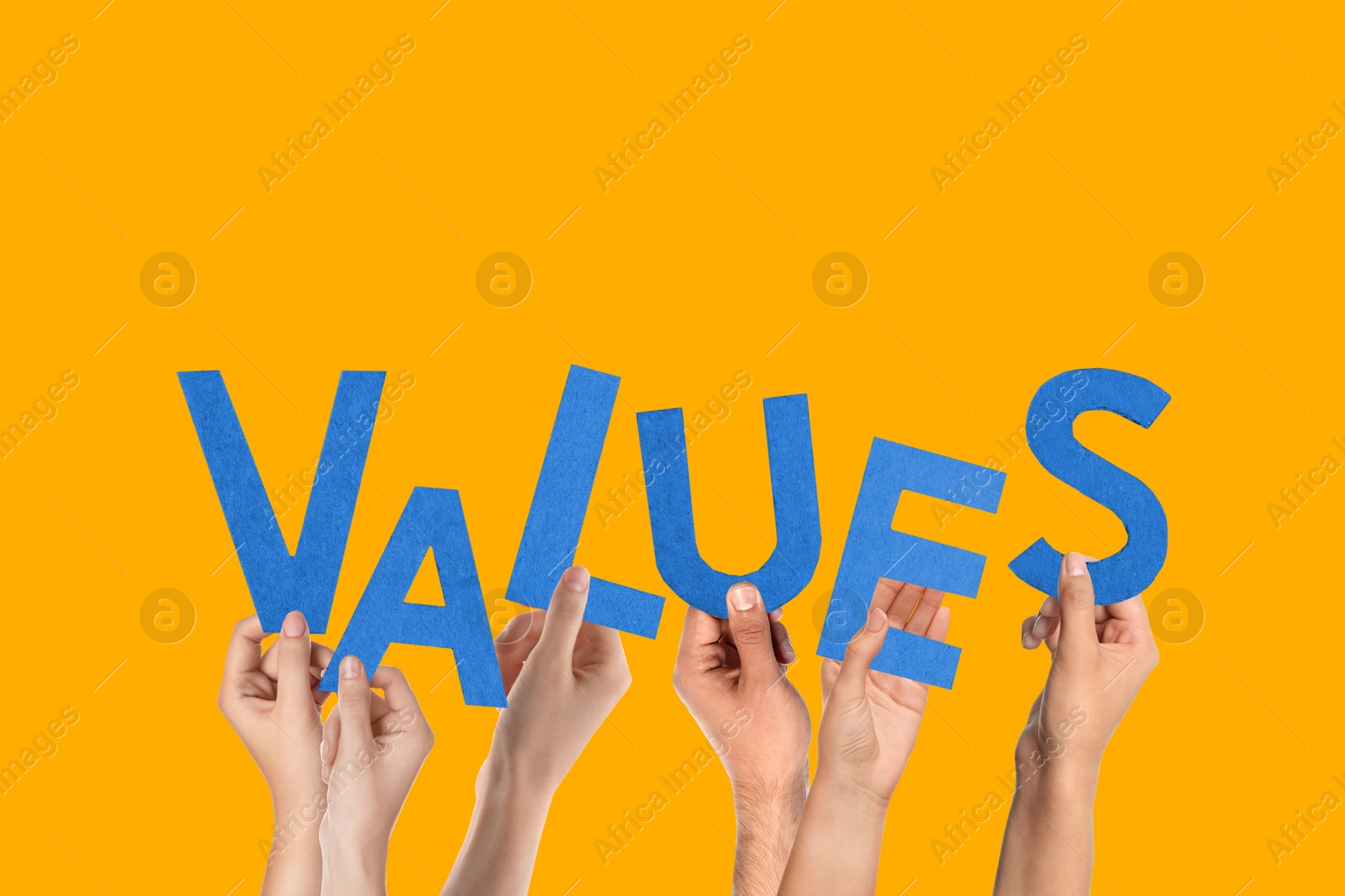 Image of People making word VALUES of letters on yellow background