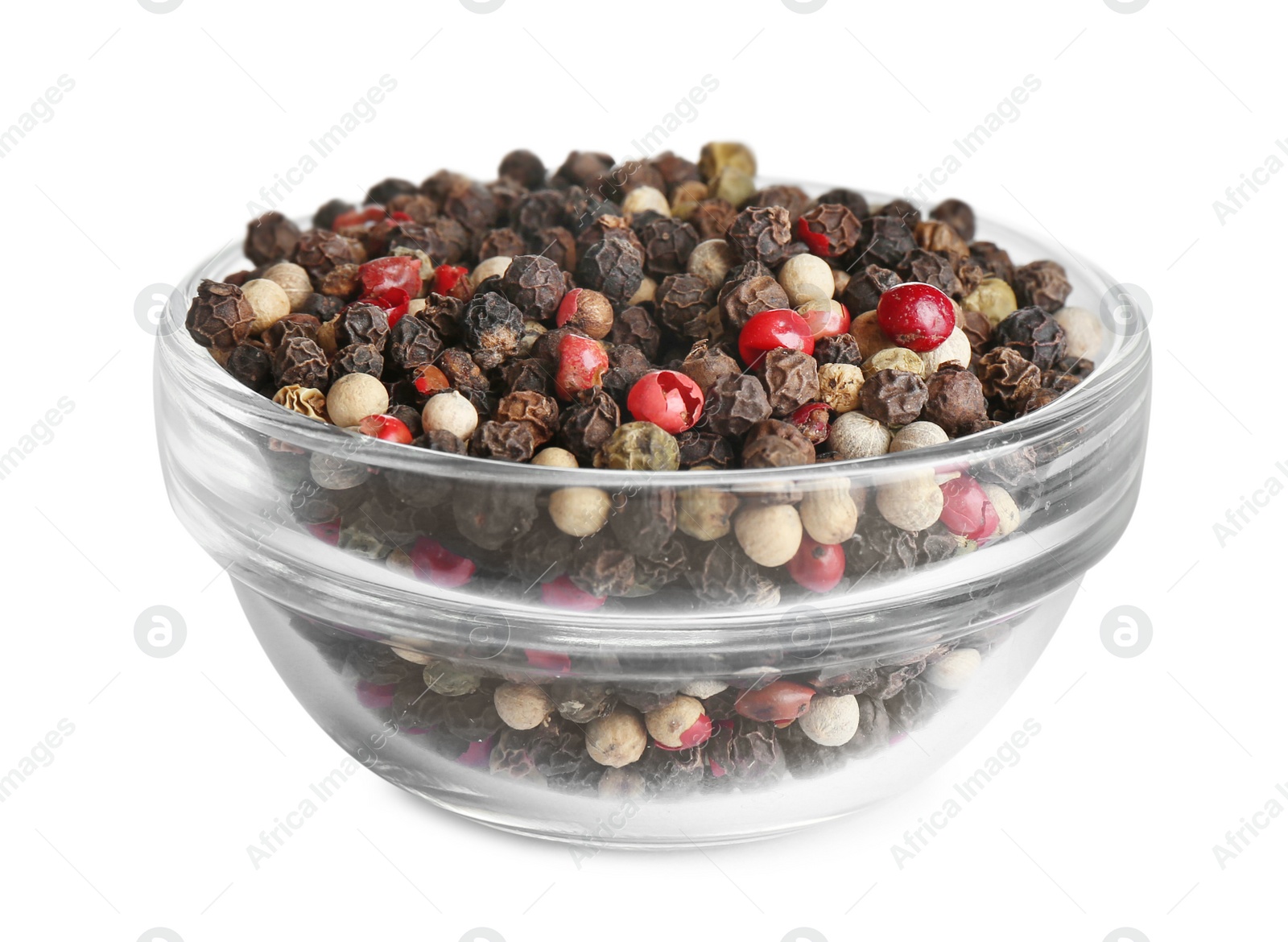 Photo of Bowl of mixed peppercorns isolated on white