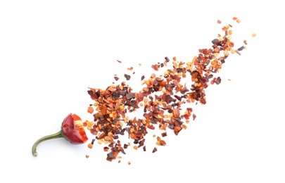 Photo of Composition with chili pepper flakes on white background, top view