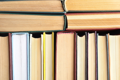 Photo of Many different hardcover books as background, top view