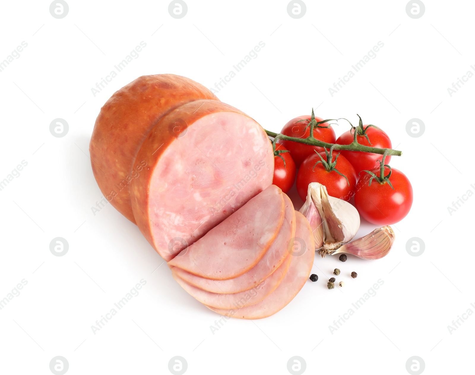 Photo of Tasty ham with cherry tomatoes, garlic and pepper isolated on white