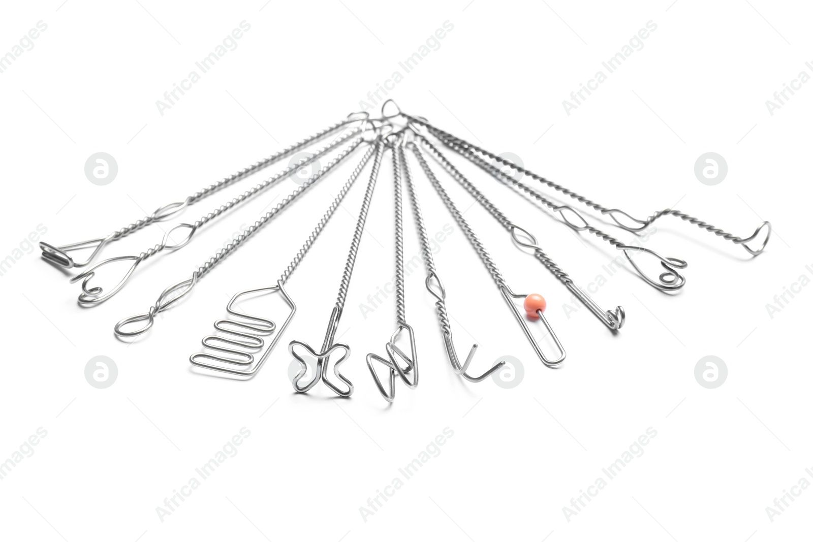 Photo of Set of logopedic probes for speech therapy on white background