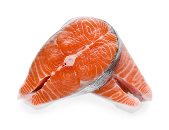 Photo of Fresh raw salmon steaks on white background, top view