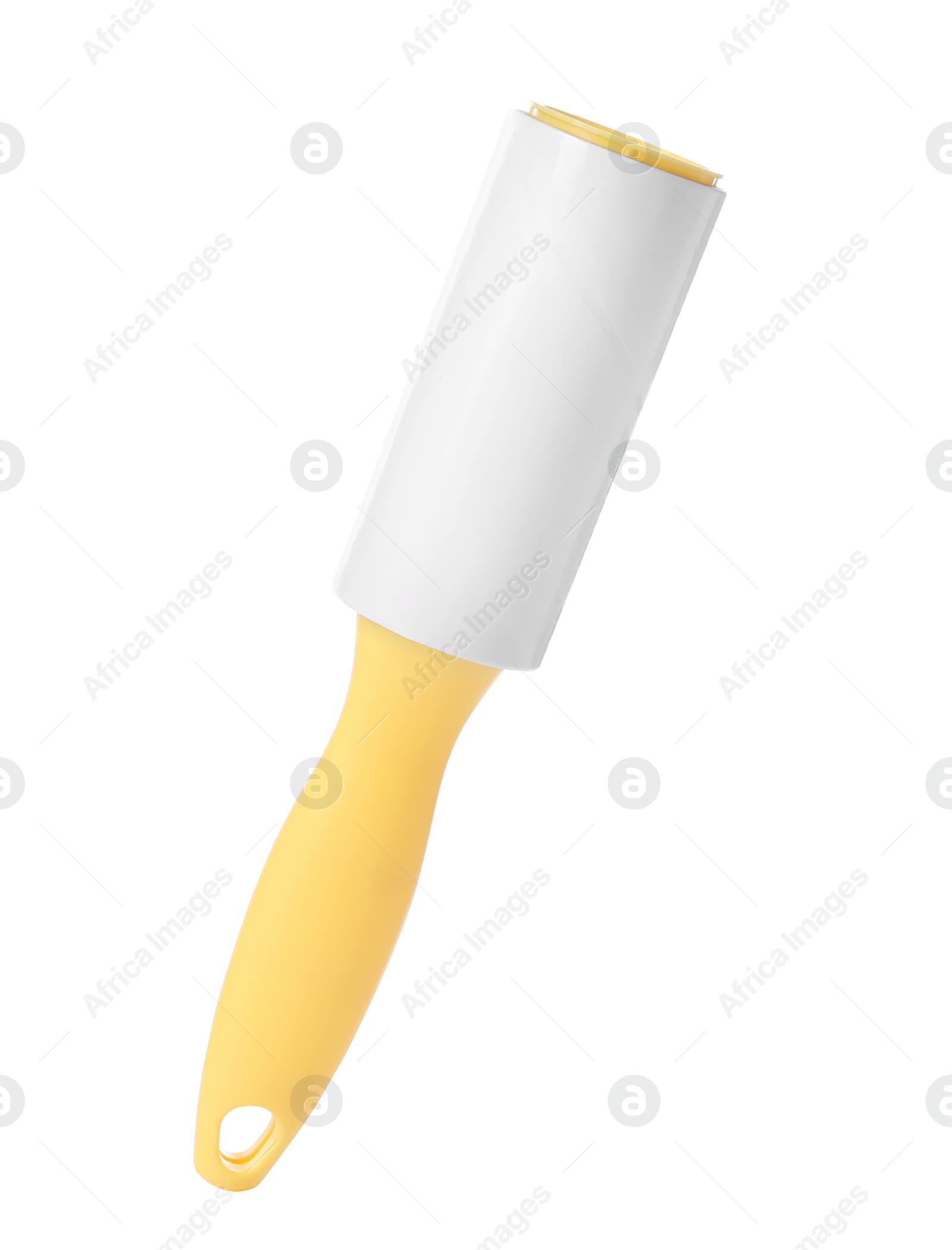 Photo of New lint roller with yellow handle isolated on white