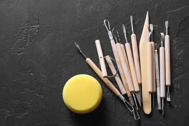 Set of different clay crafting tools and pottery sponge