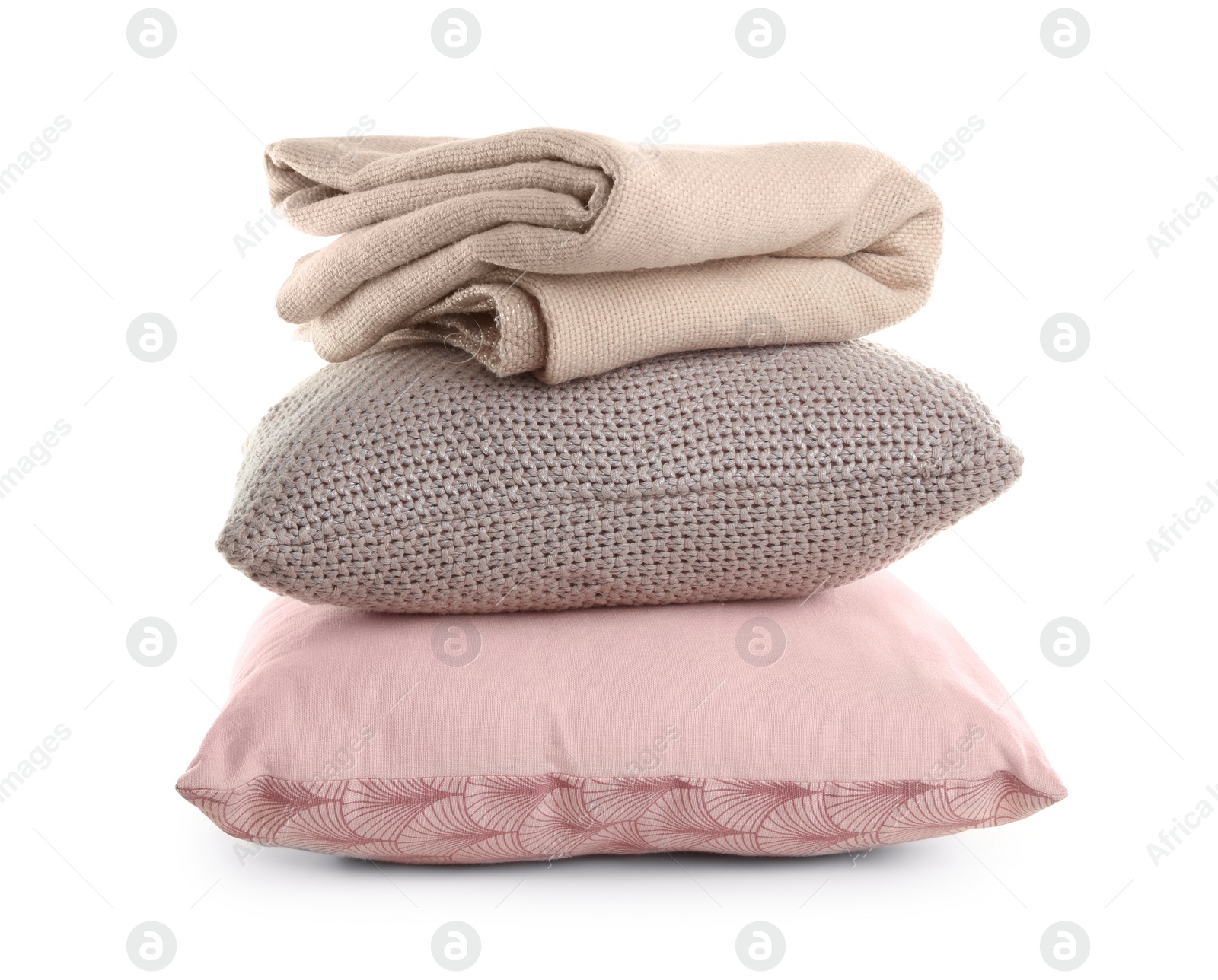 Photo of Stylish soft pillows and folded plaid on white background