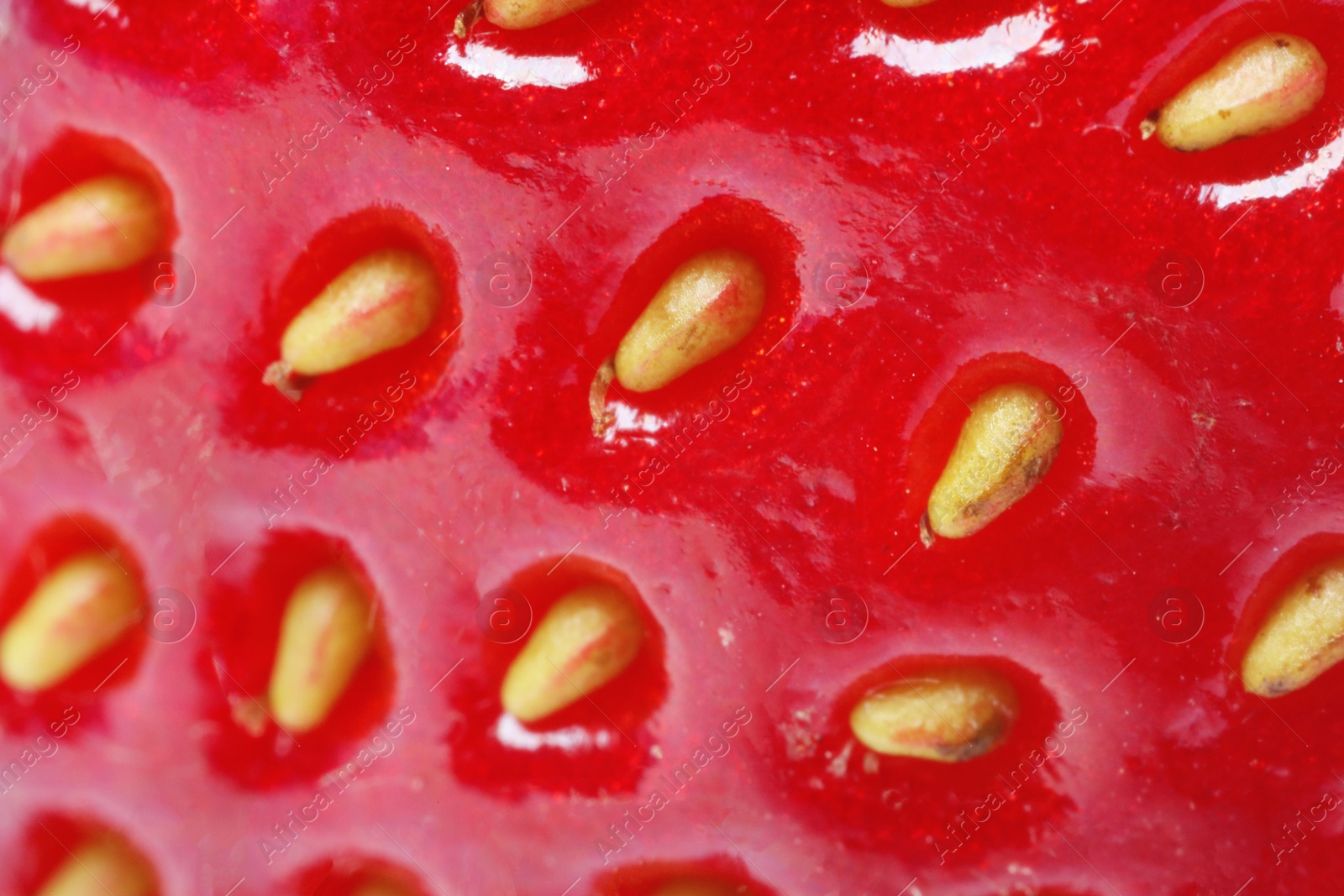 Photo of Texture of ripe strawberry as background, macro view. Fresh berry