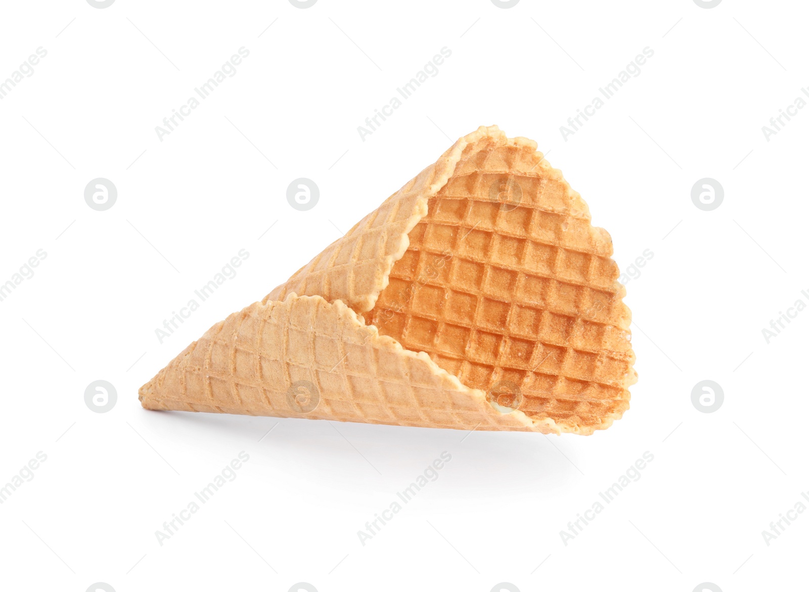Photo of Empty wafer ice cream cone on white background