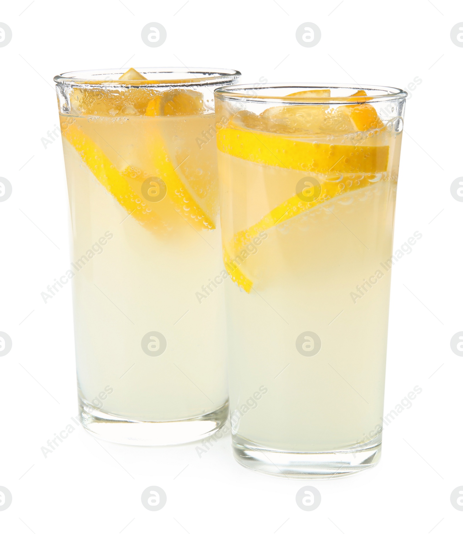 Photo of Refreshing lemonade in glasses on white background