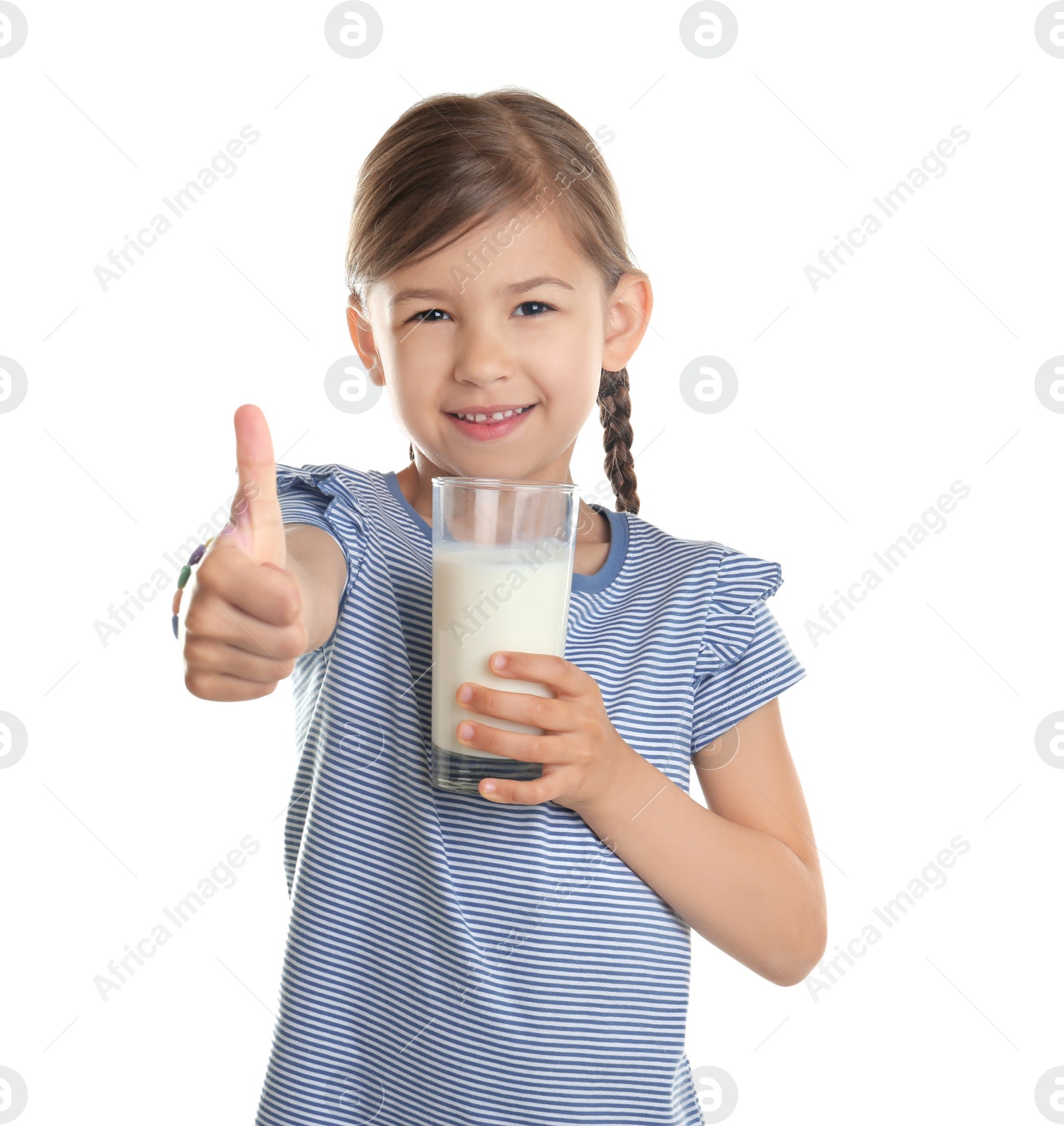 Photo of Cute little girl with glass of milk on white background