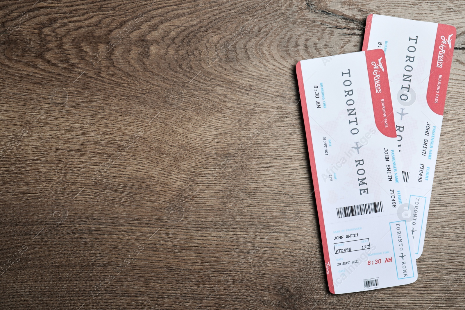 Photo of Tickets on wooden table, flat lay with space for text. Travel agency concept