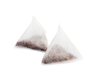 New pyramid tea bags on white background