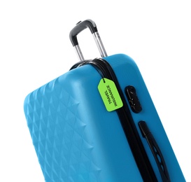 Photo of Blue suitcase with TRAVEL INSURANCE label on white background