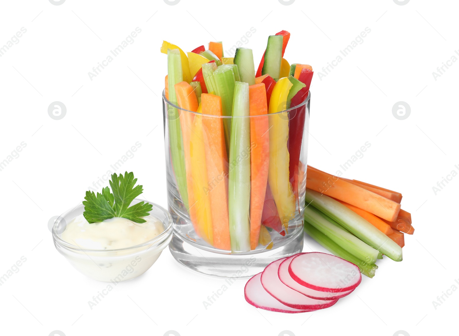 Photo of Different vegetables cut in sticks and bowl with dip sauce on white background