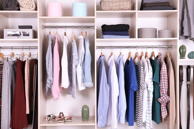 Photo of Large wardrobe with different clothes