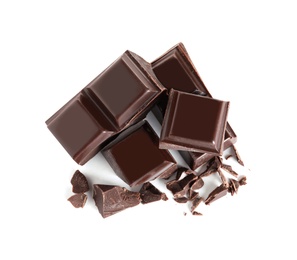 Photo of Pieces of tasty black chocolate on white background, top view