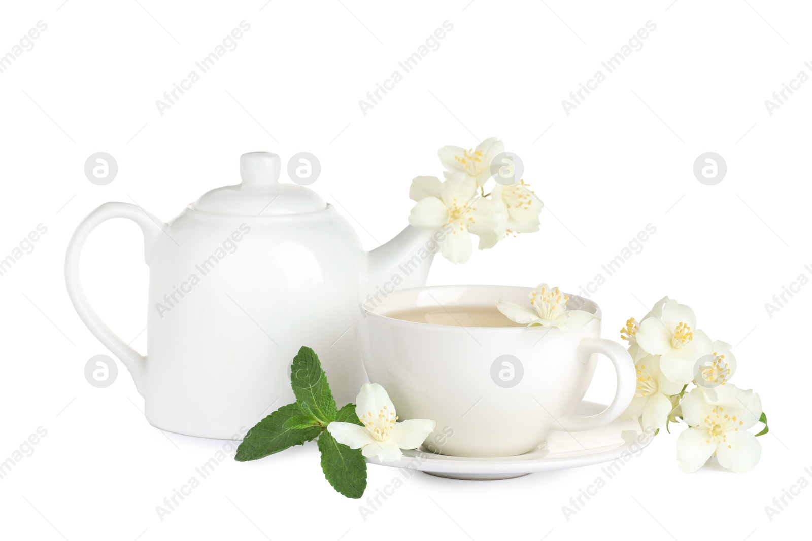 Photo of Aromatic herbal tea with mint and jasmine flowers isolated on white