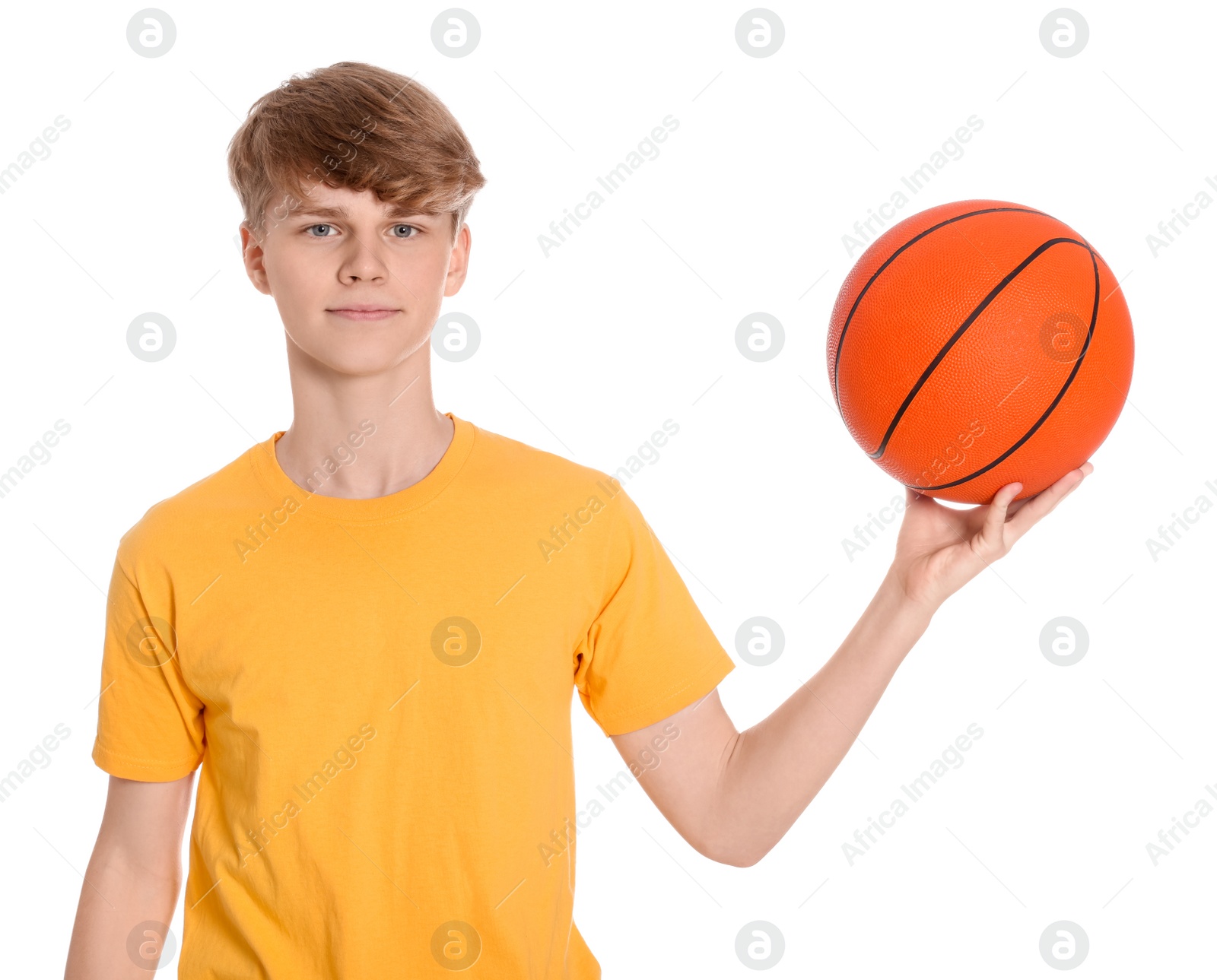 Photo of Teenage boy with basketball ball on white background