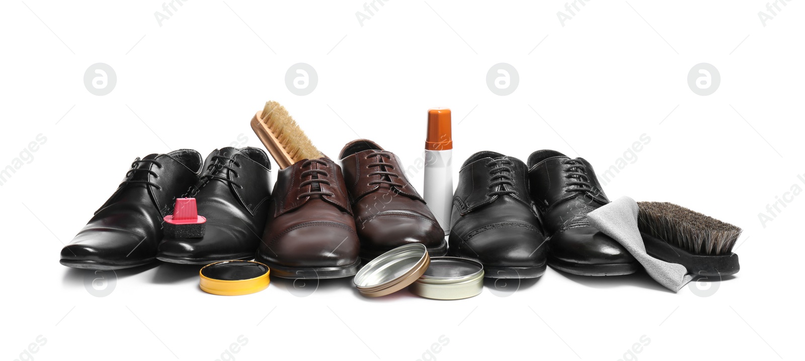 Photo of Stylish men's footwear and shoe care accessories on white background