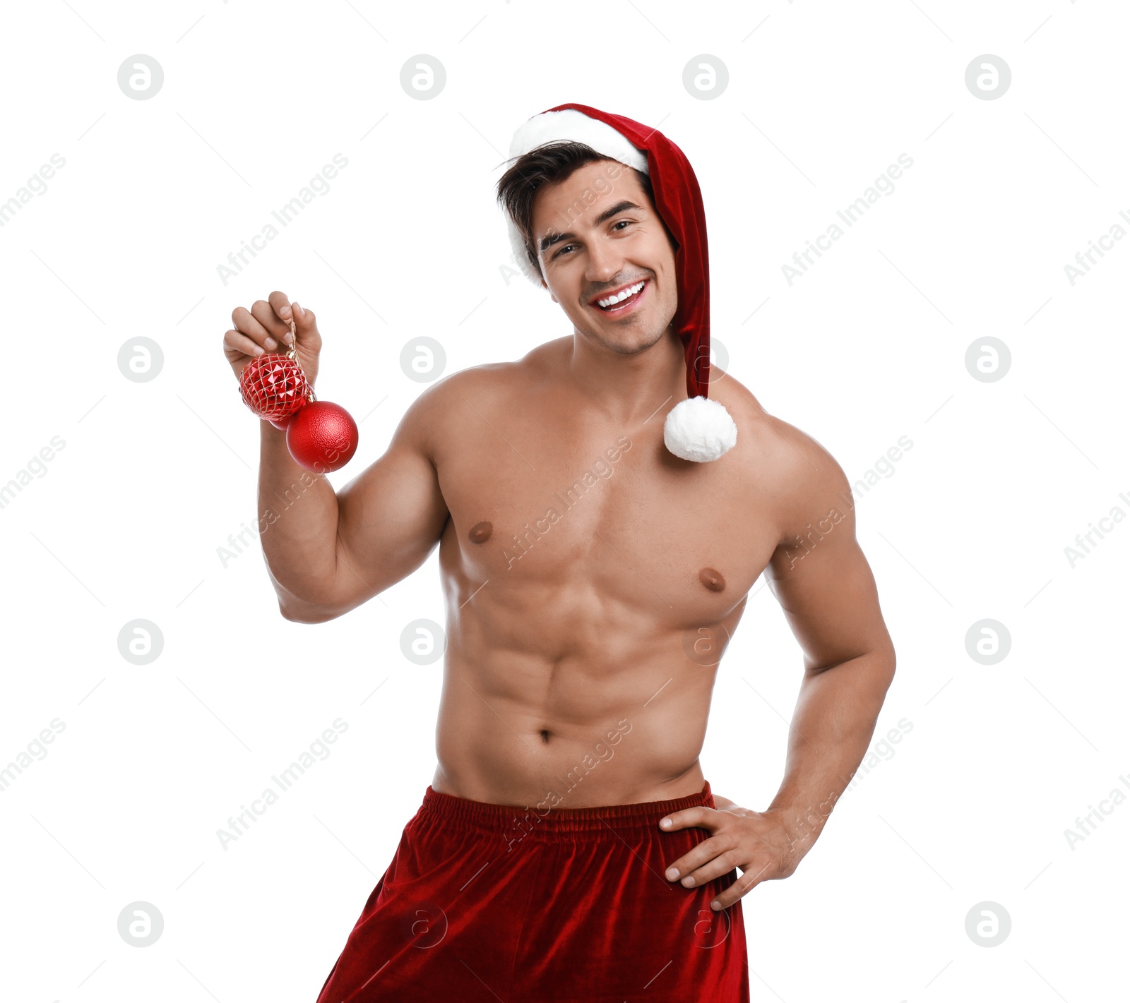 Photo of Sexy shirtless Santa Claus with Christmas balls on white background
