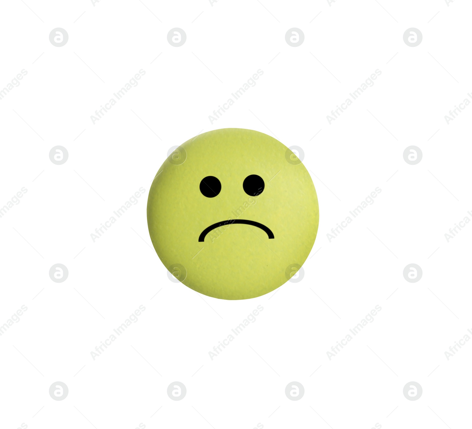 Image of Yellow pill with sad face on white background