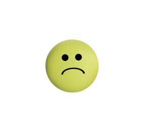 Image of Yellow pill with sad face on white background