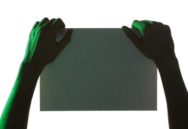 Man holding sheet of paper on white background, closeup and space for text. Color tone effect