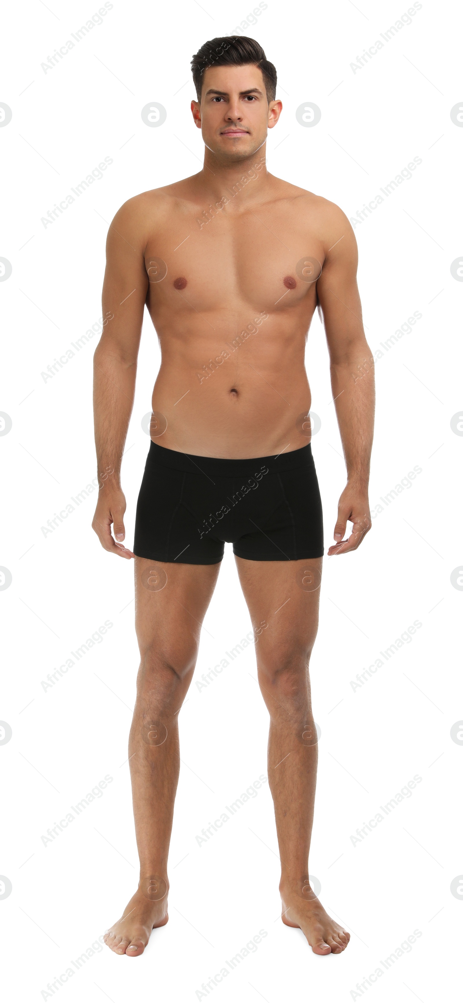 Photo of Handsome man in black underwear on white background