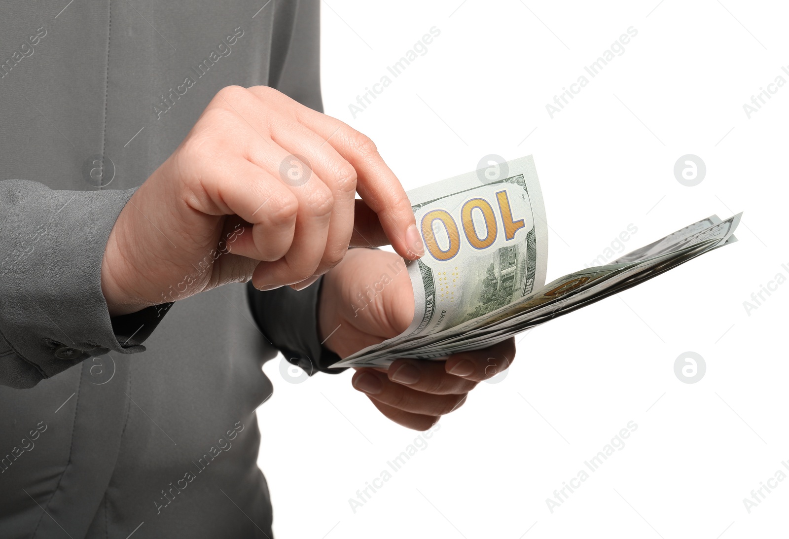 Photo of Money exchange. Woman counting dollar banknotes on white background, closeup