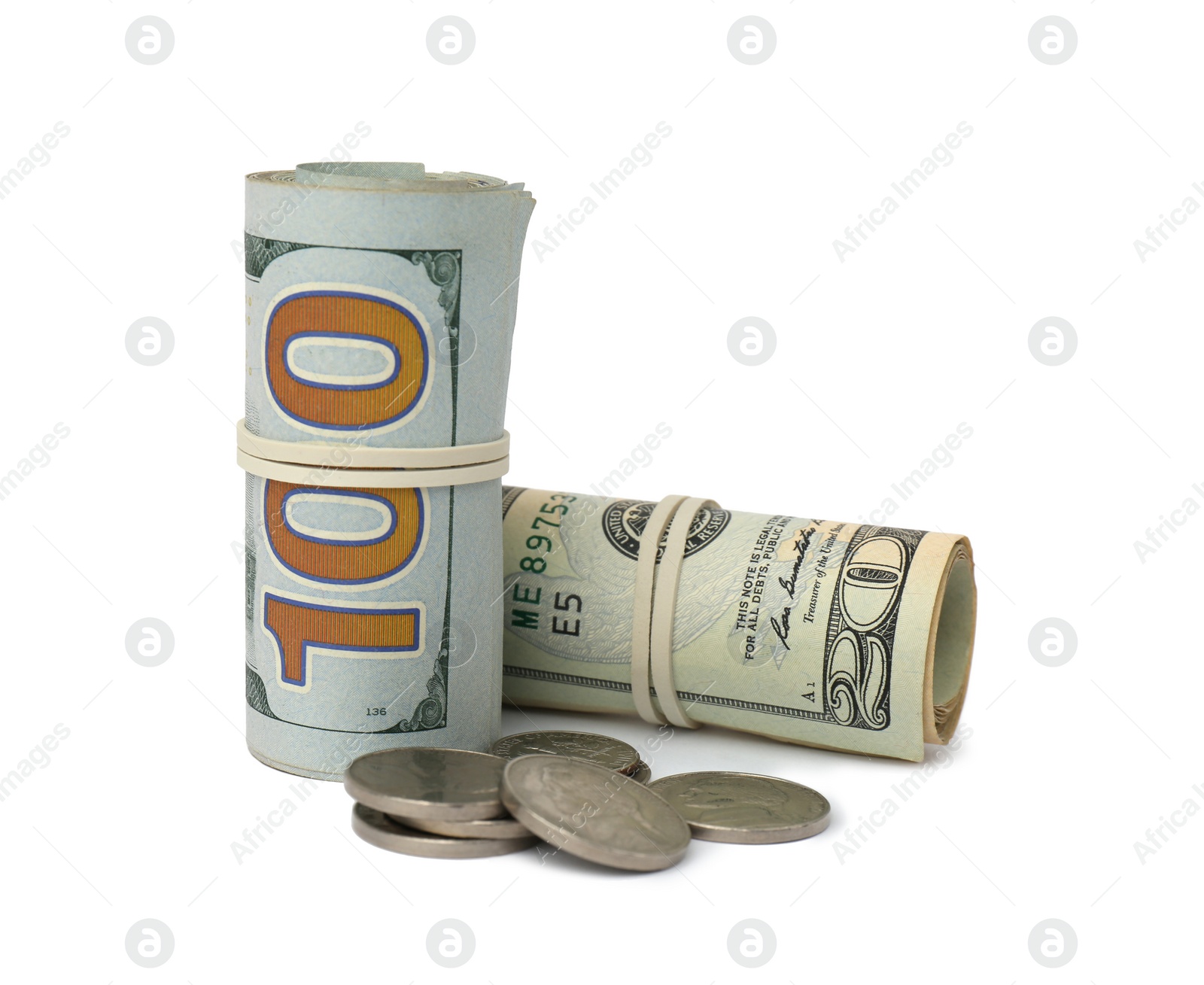 Photo of Rolled dollar banknotes and coins on white background