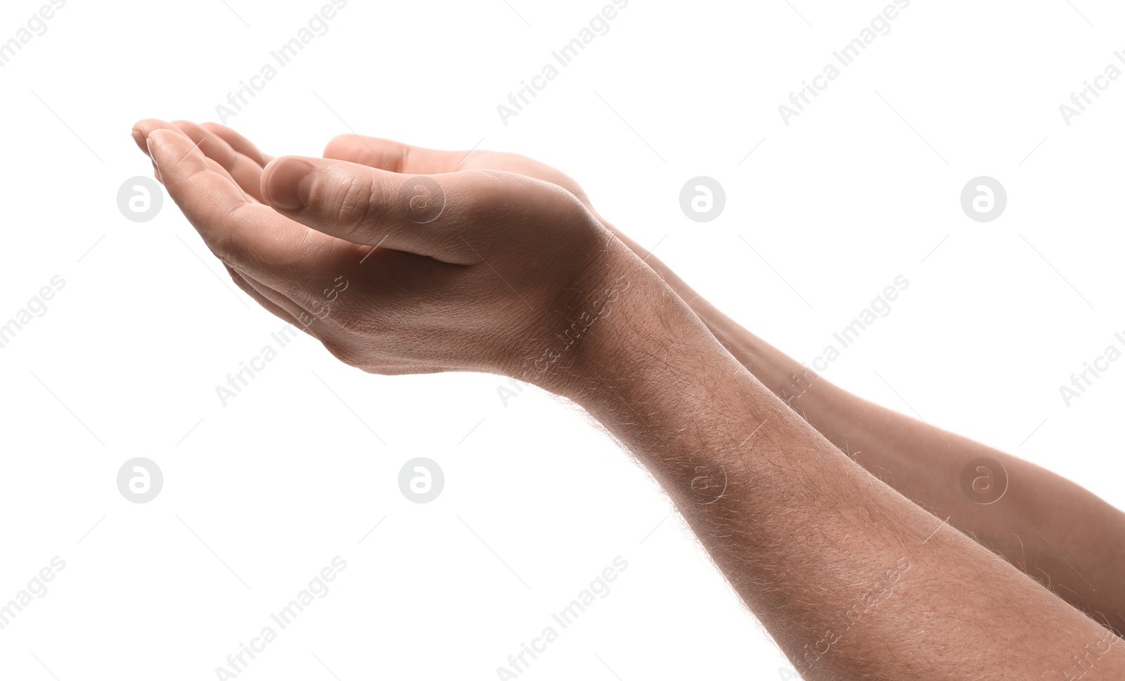 Photo of Religion. Man with open palms praying on white background, closeup